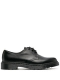 Dr. Martens black derby shoes