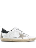 Golden Goose Super-Star trainers with black heel tab and metal stud lettering