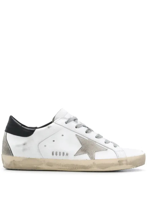 Golden Goose Super-Star trainers with black heel tab and metal stud lettering