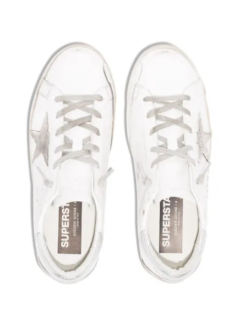 Golden Goose Super-Star trainers with silver heel tab and metal stud lettering