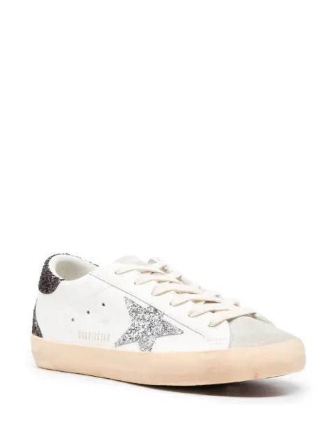 Golden Goose Super-Star trainers with silver glitter star and brown glitter heels tab