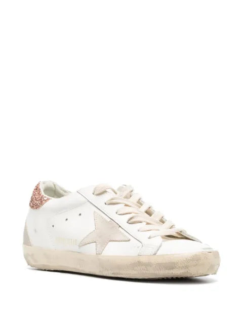 Golden Goose Super-Star trainers with a suede star and peach-pink glitter heels tab