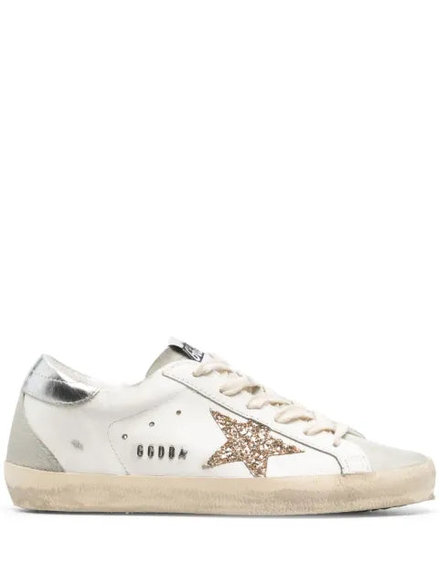 Golden Goose Super-Star trainers with gold glitter star and ice-gray suede inserts