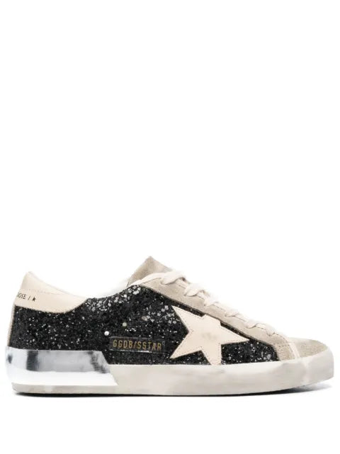 Golden Goose Super-Star trainers in black glitter with cream star and suede inserts