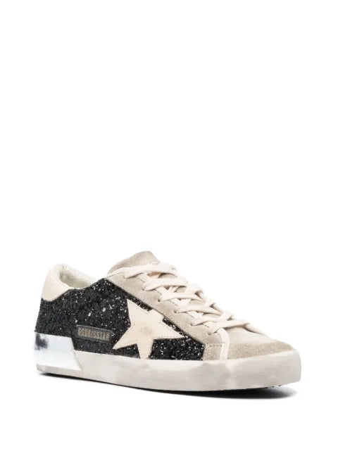 Golden Goose Super-Star trainers in black glitter with cream star and suede inserts