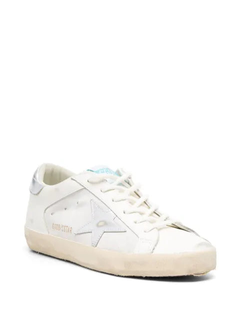 Golden Goose Super-Star trainers in white leather and suede with silver and gold leather star