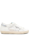 Golden Goose Super-Star trainers in white leather and suede with silver and gold leather star