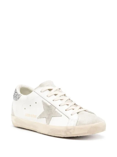 Golden Goose Super-Star trainers with gray star and silver glitter heels tab