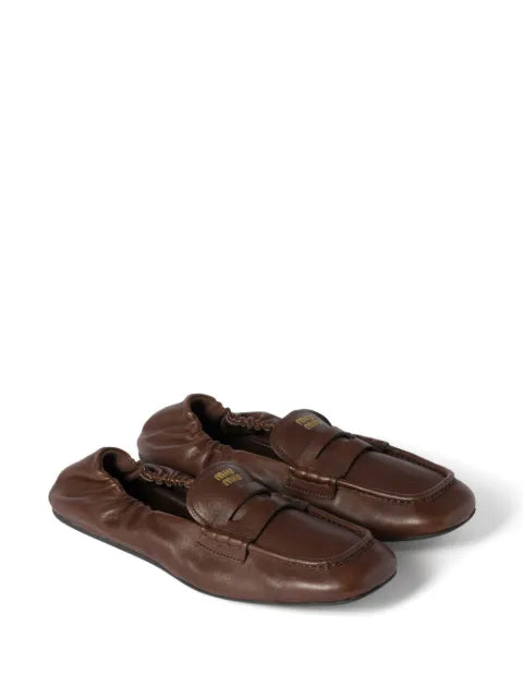 Miu Miu embossed-logo loafers