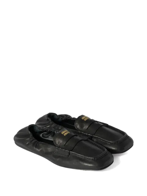 Miu Miu embossed-logo loafers