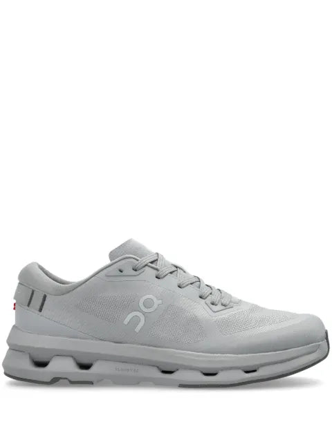On logo-print trainers
