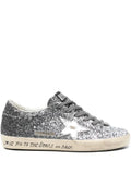 Golden Goose Super Star trainers with glitter upper and silver metallic leather star
