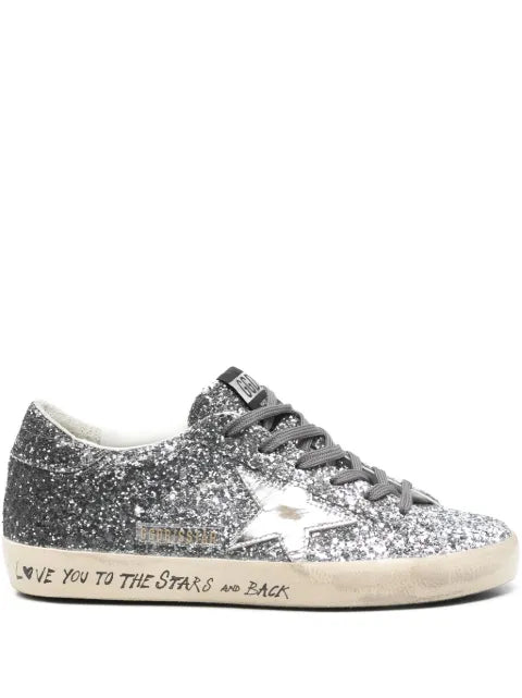 Golden Goose Super Star trainers with glitter upper and silver metallic leather star
