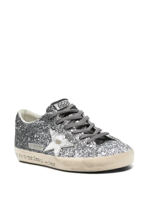 Golden Goose Super Star trainers with glitter upper and silver metallic leather star