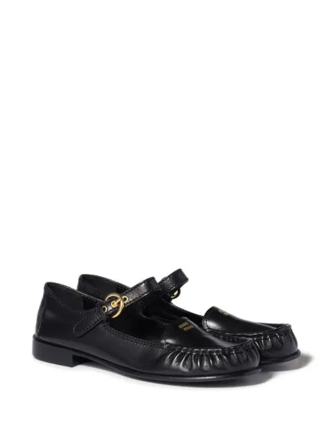 Miu Miu leather loafers with strap