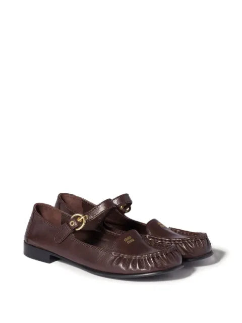 Miu Miu leather loafers with strap