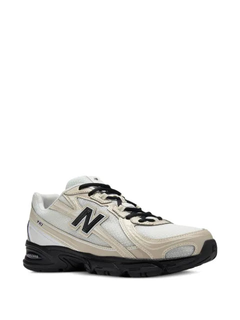 New Balance 740 mesh overlay sneakers