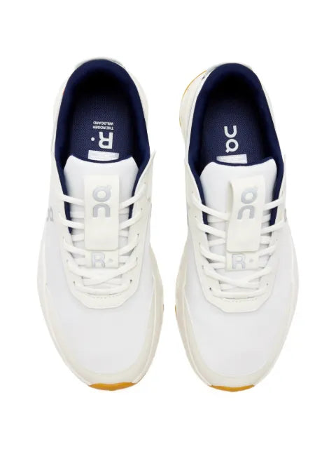 On lace-up panelled sneakers