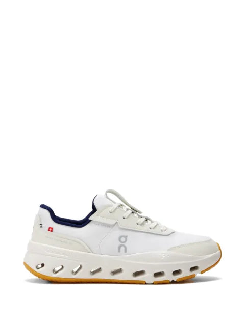 On lace-up panelled sneakers