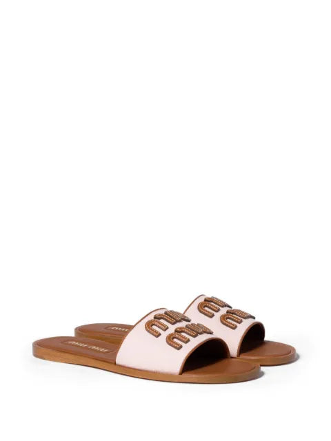 Miu Miu canvas and leather slides
