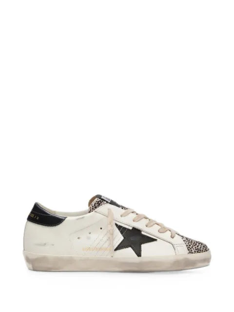 Golden Goose Super-Star LTD in white leather with black star and pony skin details sneakers