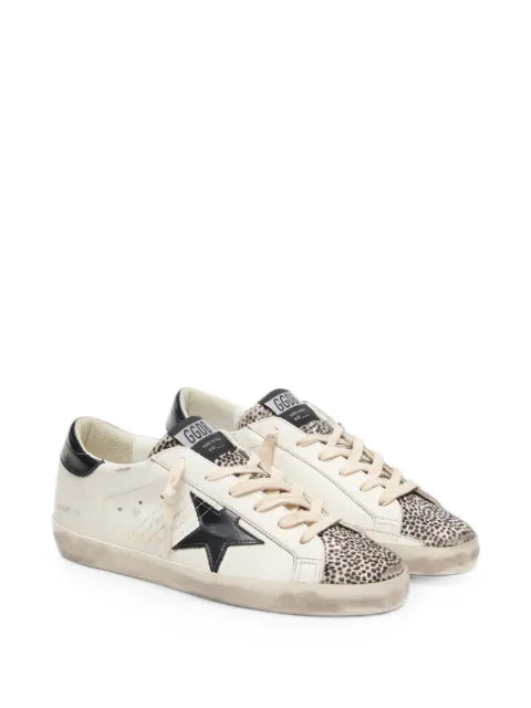 Golden Goose Super-Star LTD in white leather with black star and pony skin details sneakers