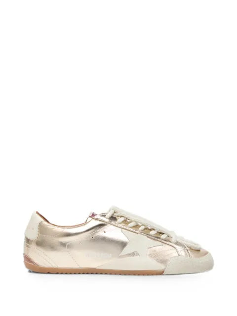 Golden Goose True-Star trainers in metallic platinum leather with light gray suede star