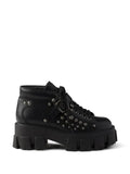 Prada Monolith studded leather booties
