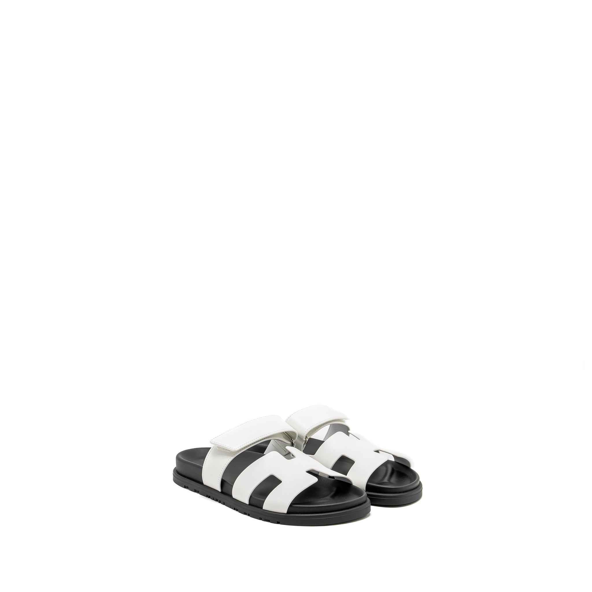 HERMES CHYPRE SANDALS WHITE